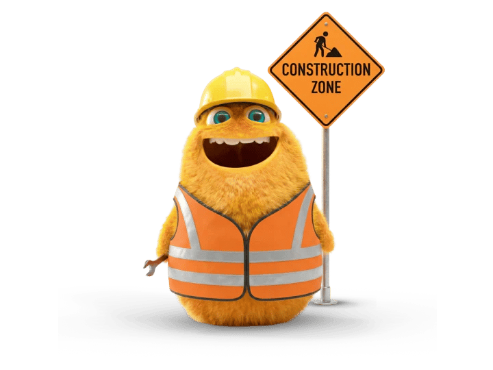 Orange Små Priser i sikkerhedsvest ved et konstruktionsskilt med teksten Construction Zone.