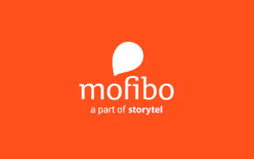 Mofibo-logo med teksten “a part of storytel” på orange baggrund.