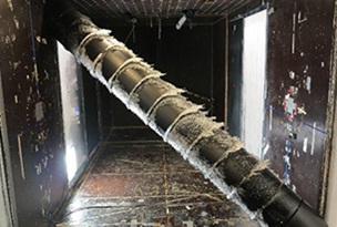 Test of new cable concept in our wind tunnel. The cabel is covered with ice.